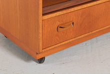 Load image into Gallery viewer, Mid Century G-plan Teak TV Cabinet on Casters c. 1970.
