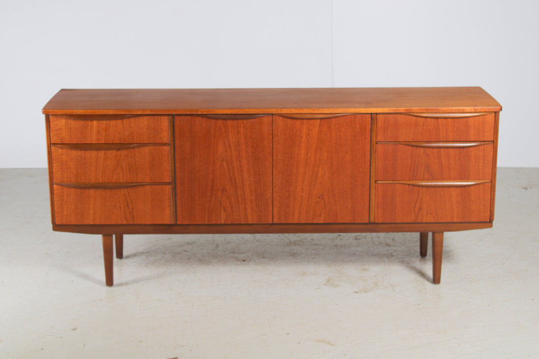 Mid Century Teak sideboard with Carved Wooden Handles.  c1960s