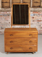 Load image into Gallery viewer, Mid Century Ercol Windsor Model 483 Vanity Chest Of Drawers With Mirror, circa 1960s.
