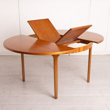 Load image into Gallery viewer, Midcentury Round Extending Teak Dining Table by McIntosh c.1960s
