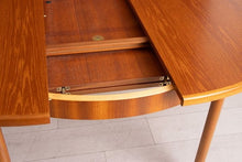 Load image into Gallery viewer, Midcentury Round Extending Teak Dining Table by McIntosh c.1960s
