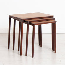 Load image into Gallery viewer, A Danish midcentury nest of three side tables made in teak and rosewood by E W Bach. Excellent restored condition.
