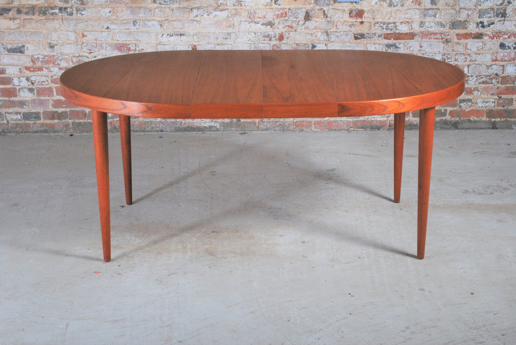 Danish Mid Century teak extending oval/round dining table by Kai Kristiansen, circa 1960s