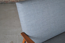 Load image into Gallery viewer, A Mid Century sofabed newly reupholstered in grey fabric, circa 1960s
