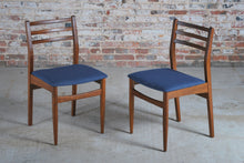 Load image into Gallery viewer, Mid Century extending teak dining table and 6 chairs, circa 1960s.
