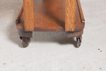 Load image into Gallery viewer, Art Deco style solid oak serving trolley on original brass casters.
