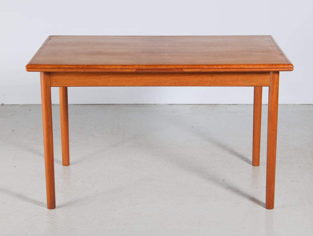 Danish Mid Century extending teak dining table by AM Mobler, circa 1960s.