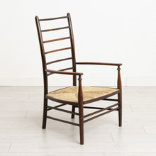 Load image into Gallery viewer, Liberty &amp; Co Arts &amp; Crafts Low Ladder Back Armchair with Rush Seat  c. 1900
