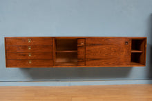 Load image into Gallery viewer, A Mid Century floating rosewood sideboard by Robert Heritage.
